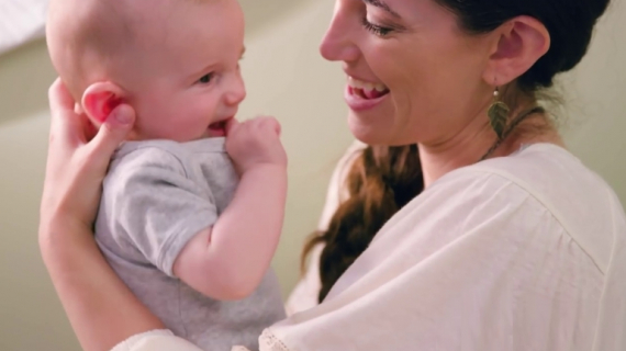 How to Put a Onesie on a Baby?